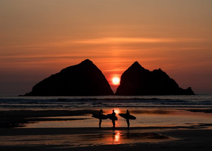 sunset surfers 700x500 - 'Bay of Dreams' Holywell Bay